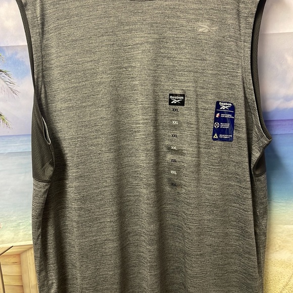 - Brand new with tags Men’s Reebok active tank top. Top has a small thread… - Picture 3 of 16